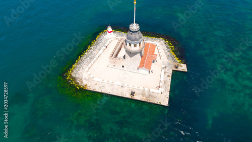 Istanbul, Turkey. Maiden s Tower Kiz Kulesi isolated on small rocky island in Bosphorus Strait aerial view. Aerial View
