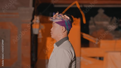 Side Profile of Man in Balinese Traditional Dress