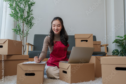 Woman preparing orders for small business e commerce