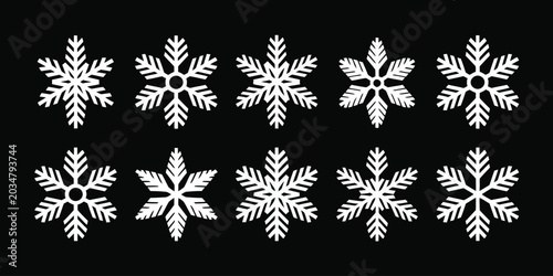 Fotografija snowflake winter icons pattern with white crystalline shapes on dark background