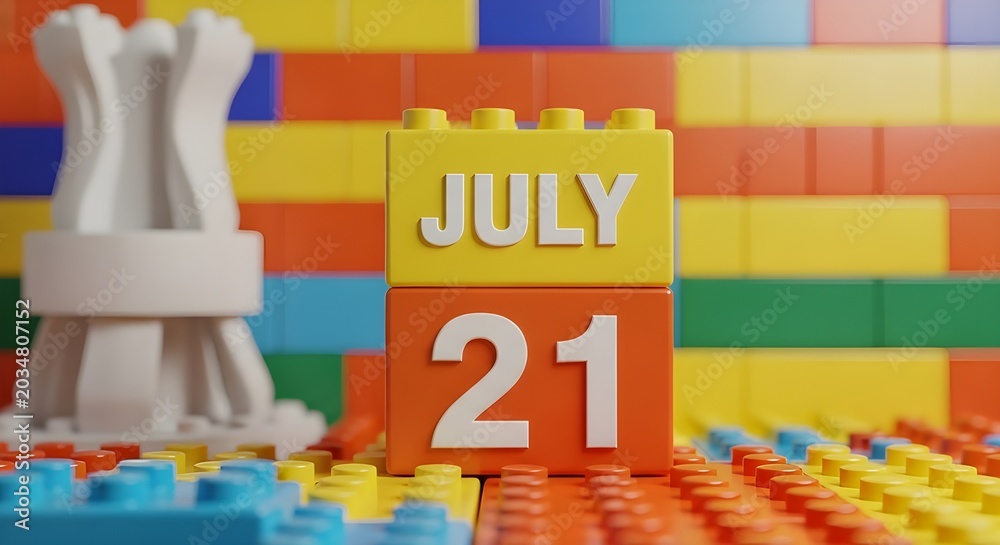 Obraz premium July 21st calendar date with building blocks and chess piece creative conceptual still life