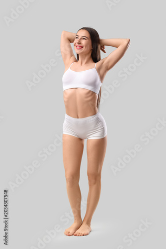 Happy young woman in stylis...