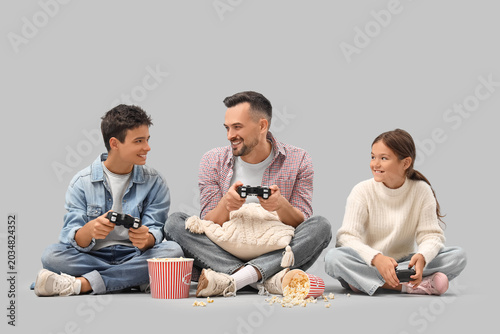 Father with his children pl...
