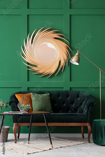 Elegant green living room i...