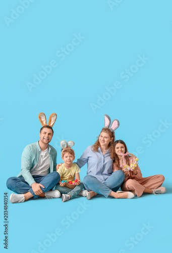 Family sitting with painted...