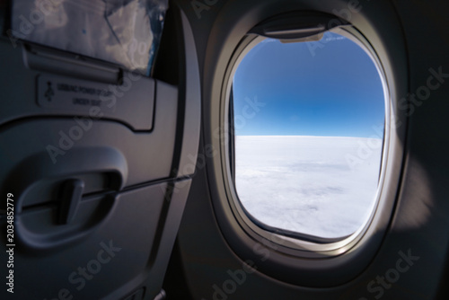 Photos Airplane window view flying above clouds in egypt
