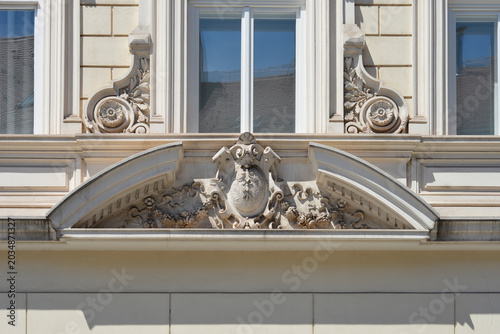 Obraz na płótnie Close up of a classic 19th century Neo Renaissance architectural relief with a decorative cartouche on a building facade in Zagreb Croatia