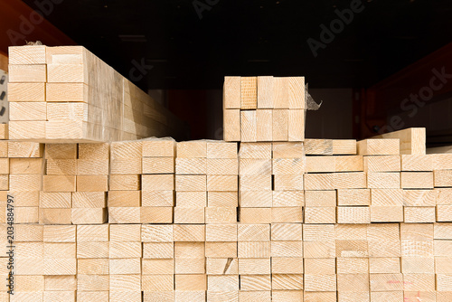 Stack of lumber pieces in a storage area