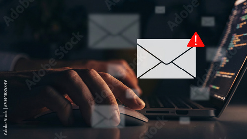 Photography Scam message alert shows user receiving fraud attempt on laptop at night