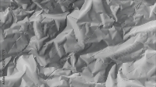Fotografía A crumpled paper texture fills the frame with gray tones