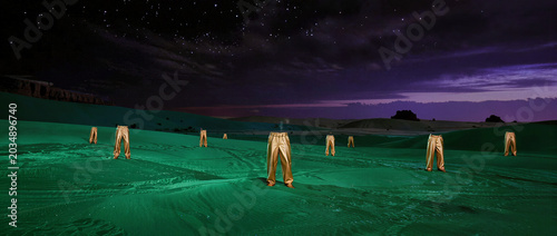 Wide shot , amazing of green desert landscape green color of sand and there are many golden pants around the sand , night time , epic landscape.