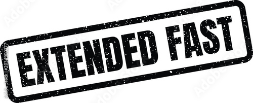 Photos Textured rubber stamp impression displaying the EXTENDED FAST message, indicatin