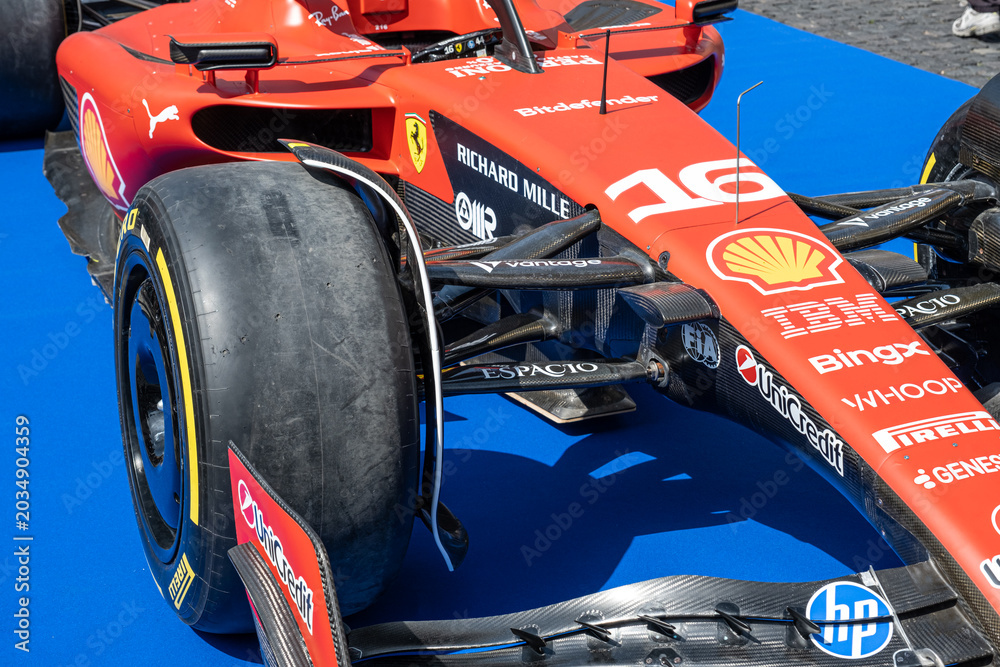 Naklejka premium Sibiu, Romania - May 25, 2026 a Ferrari SF-26 Formula 1 car unveiled for the 2026 exhibited in the large square in the city center Sibiu