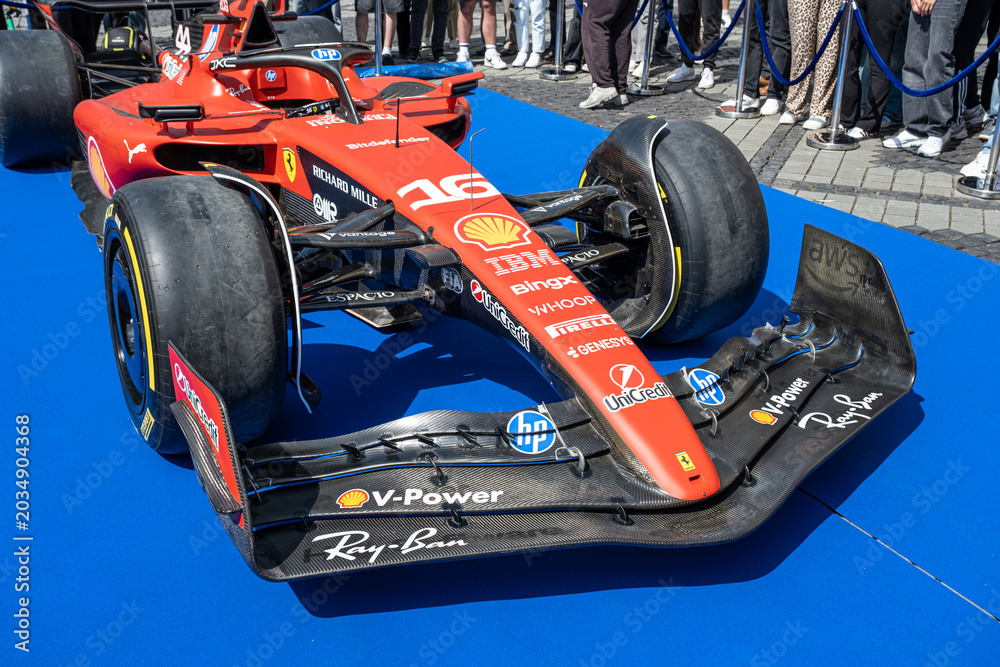 Naklejka premium Sibiu, Romania - May 25, 2026 a Ferrari SF-26 Formula 1 car unveiled for the 2026 exhibited in the large square in the city center Sibiu