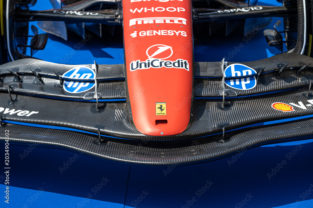 Naklejka premium Sibiu, Romania - May 25, 2026 a Ferrari SF-26 Formula 1 car unveiled for the 2026 exhibited in the large square in the city center Sibiu