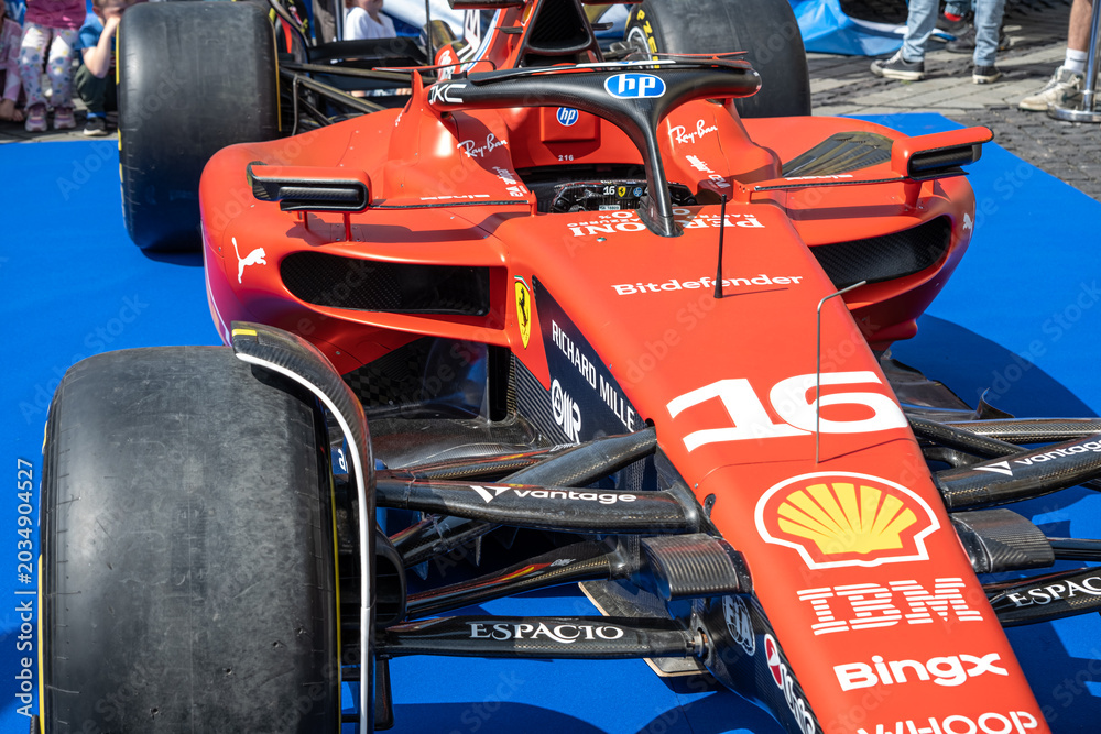 Naklejka premium Sibiu, Romania - May 25, 2026 a Ferrari SF-26 Formula 1 car unveiled for the 2026 exhibited in the large square in the city center Sibiu