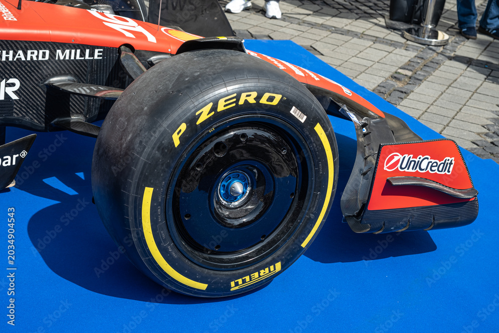 Fototapeta premium Sibiu, Romania - May 25, 2026 a Ferrari SF-26 Formula 1 car unveiled for the 2026 exhibited in the large square in the city center Sibiu