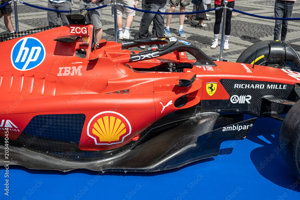Fototapeta premium Sibiu, Romania - May 25, 2026 a Ferrari SF-26 Formula 1 car unveiled for the 2026 exhibited in the large square in the city center Sibiu