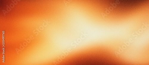 Fotografía Warm orange gradient background with soft light leak, abstract amber glow texture for cinematic overlay, blurry golden sun flare backdrop, vibrant autumnal color wash for creative design