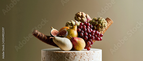 Cornucopia overflowing with fruits and vegetables for Thanksgiving day, autumn, fall  