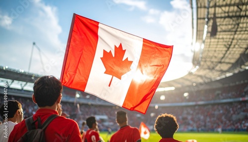 Soccer supporter cheering with flag of Canada at the World Cup