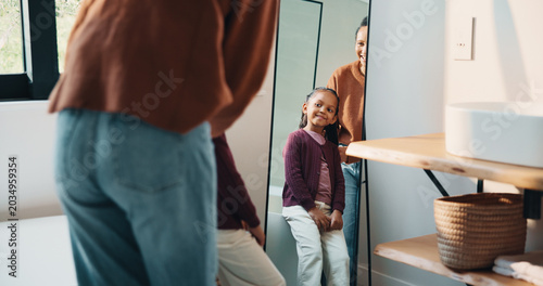 Bild auf Leinwand Hair care, mother and girl with mirror in bathroom, grooming help and support for morning routine