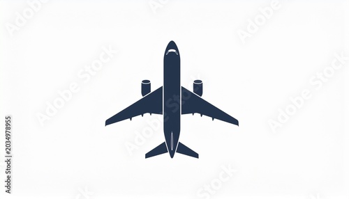 An airplane flies through clear blue skies overhead.