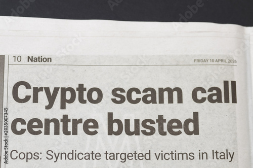 фотографія Crypto scam call centre busted newspaper article headline showing police crackdo