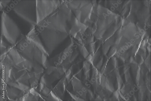 фотографія Crumpled paper texture fills the entire frame with gray tones