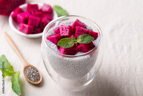 Картината върху платно Chia pudding topped with fresh dragon fruit in a glass, Healthy eating