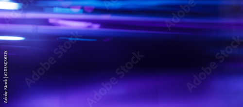 Photos Purple abstract background with light streaks