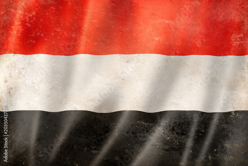 Old vintage flag of Yemen, worn and stained