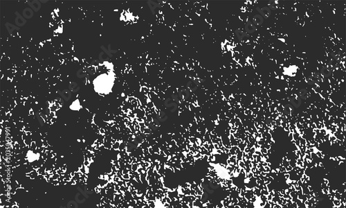 High-contrast black-and-white rough texture with irregular mottled patches and speckles, abstract distressed surface background for design, art, or material analysis