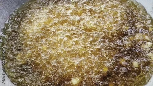 cooking cooking oil in a pan