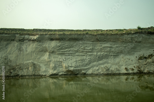 Deeply eroded by river currents and monsoon floods