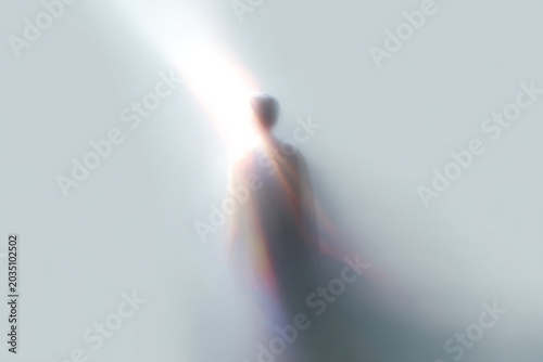 Ascending spirit bathed in a beam of light with blurred human form for spiritual background and transcendence poster design