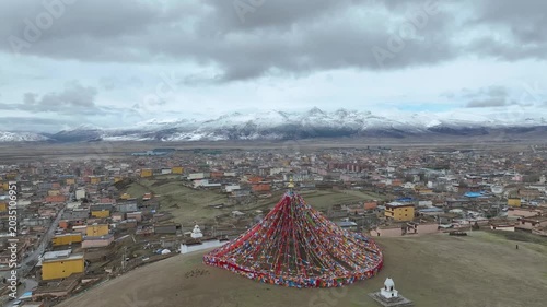Tibetan Prayer Flags on Hill Above Mountain Town