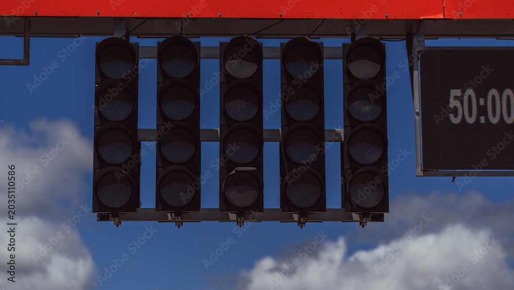 Obraz premium Motorsport starting lights on a speed circuit. Car racing. Competition. Graphic resource