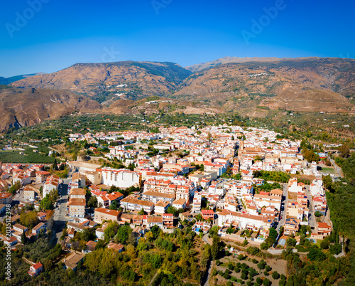 Orgiva town aerial panoramic view in Alpujarras, Spain
