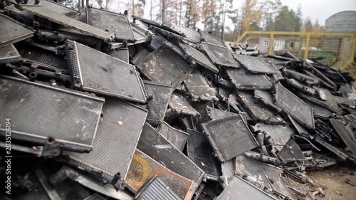 
Recycling of old cars. Automotive scrap. Recycling. Ecology and the environment. Scrap metal from old, destroyed cars. Metal recycling.