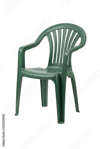 Bild auf Leinwand Green plastic garden chair isolated on black