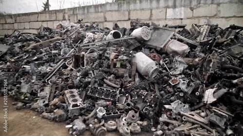 
Recycling of old cars. Automotive scrap. Recycling. Ecology and the environment. Scrap metal from old, destroyed cars. Metal recycling.