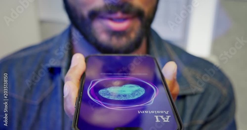Extreme close up of a man holding smartphone near his mouth, talking to a virtual AI voice assistant application. Mobile speech recognition, conversational AI technology, modern digital lifestyle.