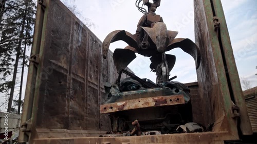 
Recycling of old cars. Automotive scrap. Recycling. Ecology and the environment. Scrap metal from old, destroyed cars. Metal recycling.