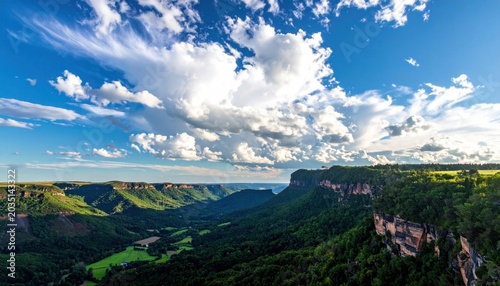 Panoramic view of green valley landscape.