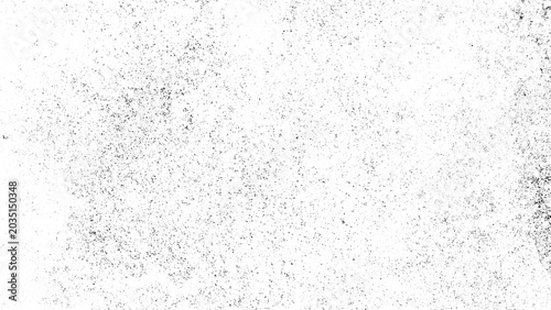 ​Black and white grunge texture background. Distressed grainy overlay for vintage or industrial design effect.