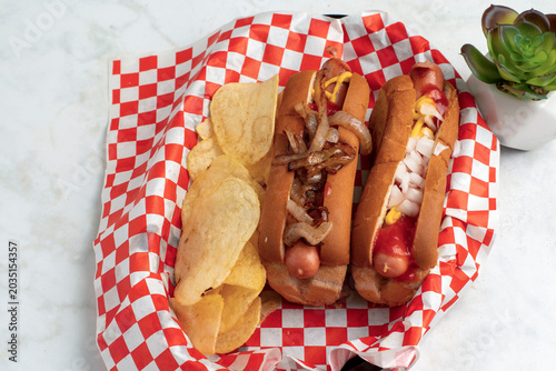 Canvas Print hot dogs with onions, ketch up and mustard