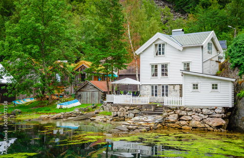 View on the coast of Geirangerfjord in town Geiranger, one of the most beautiful fjords in Norway