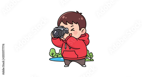 Young Boy Taking Photos With Handheld Camera Outdoors.