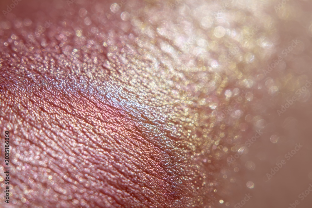 Fototapeta premium Close-up Macro Shot of Iridescent Pigment Swatch with Shimmering Particles.